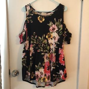 Open shoulder black top with floral design
